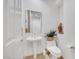 Clean powder room with pedestal sink, toilet, and decorative accents at 2785 Soft Horizon Way, Las Vegas, NV 89135