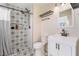 Updated bathroom boasts a sleek vanity and a stylish shower with decorative tile at 308 Fox Cir, Las Vegas, NV 89107