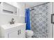 Updated bathroom featuring new vanity, toilet, shower, and designer-tiled walls at 308 Fox Cir, Las Vegas, NV 89107