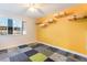 Bedroom featuring bright yellow wall and a geometric patterned carpet at 308 Fox Cir, Las Vegas, NV 89107