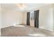 Bright bedroom with gray curtains over a well-lit window at 308 Fox Cir, Las Vegas, NV 89107