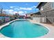 In-ground pool with turquoise water, ideal for cooling off on hot days at 308 Fox Cir, Las Vegas, NV 89107