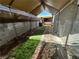 Enclosed backyard area featuring brick pavers and artificial turf at 3601 Chevy Chase Ave, Las Vegas, NV 89110