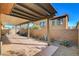 Relaxing covered patio with desert landscaping, perfect for outdoor entertaining or quiet enjoyment at 3932 Maldive Isle Ct, Las Vegas, NV 89129