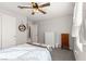 Bedroom showcasing neutral paint, ceiling fan, and closet at 452 Triple Falls St, Indian Springs, NV 89018