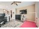 Functional bonus room features a play area, shelving, and television for entertainment at 4813 Stony Hill St, North Las Vegas, NV 89031