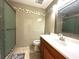 Bathroom with updated cabinets, sink and shower with glass door at 5255 Autumn Sky Rd, Las Vegas, NV 89118