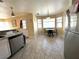 Eat-in kitchen featuring tile floors and an adjacent dining area at 5255 Autumn Sky Rd, Las Vegas, NV 89118