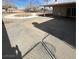 A spacious backyard with a concrete patio and bare landscaping at 5312 W Oakey Blvd, Las Vegas, NV 89146