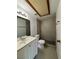 Bathroom featuring tile flooring, a shower, a modern vanity with a sink and chrome fixtures at 5312 W Oakey Blvd, Las Vegas, NV 89146