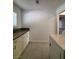 Convenient laundry room setup with ample counter space and machine hookups at 5312 W Oakey Blvd, Las Vegas, NV 89146