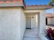 Welcoming front entrance of a home with a covered porch and manicured landscaping at 592 Grimsby Ave, Henderson, NV 89014