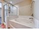 Bathroom featuring a separate shower and a relaxing soaking tub at 5952 Long Bay St, Las Vegas, NV 89148