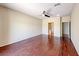 Large main bedroom featuring hardwood floors, a ceiling fan and ensuite bathroom at 5952 Long Bay St, Las Vegas, NV 89148