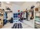 Spacious walk-in closet with ample storage, shelving, and modern organization at 6033 Bugsy St, North Las Vegas, NV 89081