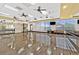 A dance studio with wood floors, mirrored wall, and multiple ceiling fans at 6144 Corbin Ave, Las Vegas, NV 89122