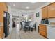 A spacious eat-in kitchen features tile flooring and access to the home's living spaces at 6144 Corbin Ave, Las Vegas, NV 89122