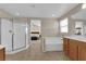 Well-lit bathroom showcasing a separate shower and tub at 6733 Fast Brook Ct, North Las Vegas, NV 89084