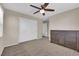 Bedroom featuring carpet, closet with double doors, and a window at 6733 Fast Brook Ct, North Las Vegas, NV 89084