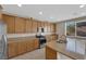 Well-equipped kitchen with granite countertops, stainless steel appliances, and ample cabinet storage at 6733 Fast Brook Ct, North Las Vegas, NV 89084