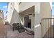 Cozy patio area with a sliding glass door, perfect for outdoor relaxation and enjoying the fresh air at 6855 Evening Orchid St, North Las Vegas, NV 89086