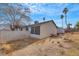 Backyard with white fencing and shed in the background at 700 Northstar St, Las Vegas, NV 89107