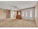 Bedroom featuring large dresser, several windows, and a ceiling fan at 700 Northstar St, Las Vegas, NV 89107