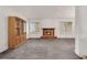 Spacious living room with brick fireplace and built-in display cabinet at 700 Northstar St, Las Vegas, NV 89107