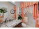 Bathroom featuring granite countertop, vanity, and a beautifully decorated shower at 8 Reverie Heights Ave, Henderson, NV 89011