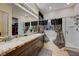 Well lit bathroom featuring granite counters, walk in shower, and separate tub at 8 Reverie Heights Ave, Henderson, NV 89011