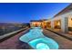 Enjoy the serenity of this uniquely shaped pool and spa, with beautiful landscaping and a peaceful waterfall feature at 8 Reverie Heights Ave, Henderson, NV 89011