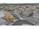 An aerial view of a well-kept home with mature trees and a tile roof in a residential neighborhood at 8036 Eurostar St, Las Vegas, NV 89131