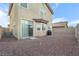 Gravel backyard area featuring sliding door entrance at 8036 Eurostar St, Las Vegas, NV 89131