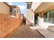 Cozy backyard with gravel landscaping and block wall at 8045 Sundance Valley Dr, Las Vegas, NV 89178