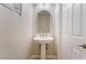 A half bathroom featuring a white pedestal sink with silver fixtures at 8045 Sundance Valley Dr, Las Vegas, NV 89178