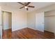 Bedroom featuring hardwood floors and a closet at 8045 Sundance Valley Dr, Las Vegas, NV 89178