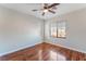 Bedroom featuring hardwood floors and a ceiling fan at 8045 Sundance Valley Dr, Las Vegas, NV 89178