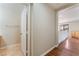 Upstairs hallway with hardwood flooring and a view of the living room at 8045 Sundance Valley Dr, Las Vegas, NV 89178