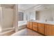 A main bathroom featuring a large soaking tub and a walk-in shower at 8045 Sundance Valley Dr, Las Vegas, NV 89178