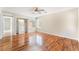 A spacious main bedroom featuring hardwood floors and a ceiling fan at 8045 Sundance Valley Dr, Las Vegas, NV 89178