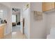 Bathroom featuring a toilet and a door leading to a bedroom and a bathtub-shower combination at 8426 Sluman Ct, Las Vegas, NV 89128