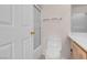 Standard bathroom featuring a toilet, shower, and a wooden vanity with a white countertop at 8426 Sluman Ct, Las Vegas, NV 89128