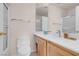 Bathroom featuring a toilet, sink and shower with towel rack at 8426 Sluman Ct, Las Vegas, NV 89128