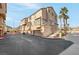 Contemporary condo building with attached garages, providing convenient parking at 8426 Sluman Ct, Las Vegas, NV 89128