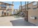 Community spa area featuring a hot tub with rock accents and a convenient drinking fountain at 8426 Sluman Ct, Las Vegas, NV 89128