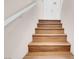 Wooden stairs, painted white handrail and entry door at the top at 8426 Sluman Ct, Las Vegas, NV 89128