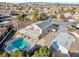 Aerial view showcasing a private backyard with a detached garage and pool at 9435 Westwind Rd, Las Vegas, NV 89139