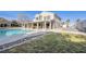 The backyard includes a pool and covered patio seating at 9435 Westwind Rd, Las Vegas, NV 89139
