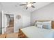 Cozy bedroom featuring a ceiling fan, neutral walls, and a comfortable bed with soft linens at 9435 Westwind Rd, Las Vegas, NV 89139
