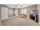Cozy bedroom with neutral tones, carpet, and a window seat for relaxation at 9435 Westwind Rd, Las Vegas, NV 89139